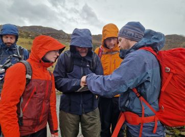 Learning to use maps in the rain